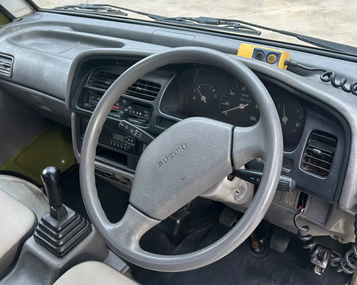 1997 Suzuki Carry Dump, 2WD + AC, a Kei Truck, for sale at Sunshine Imports in Austin, TX (photo 11 of 12)