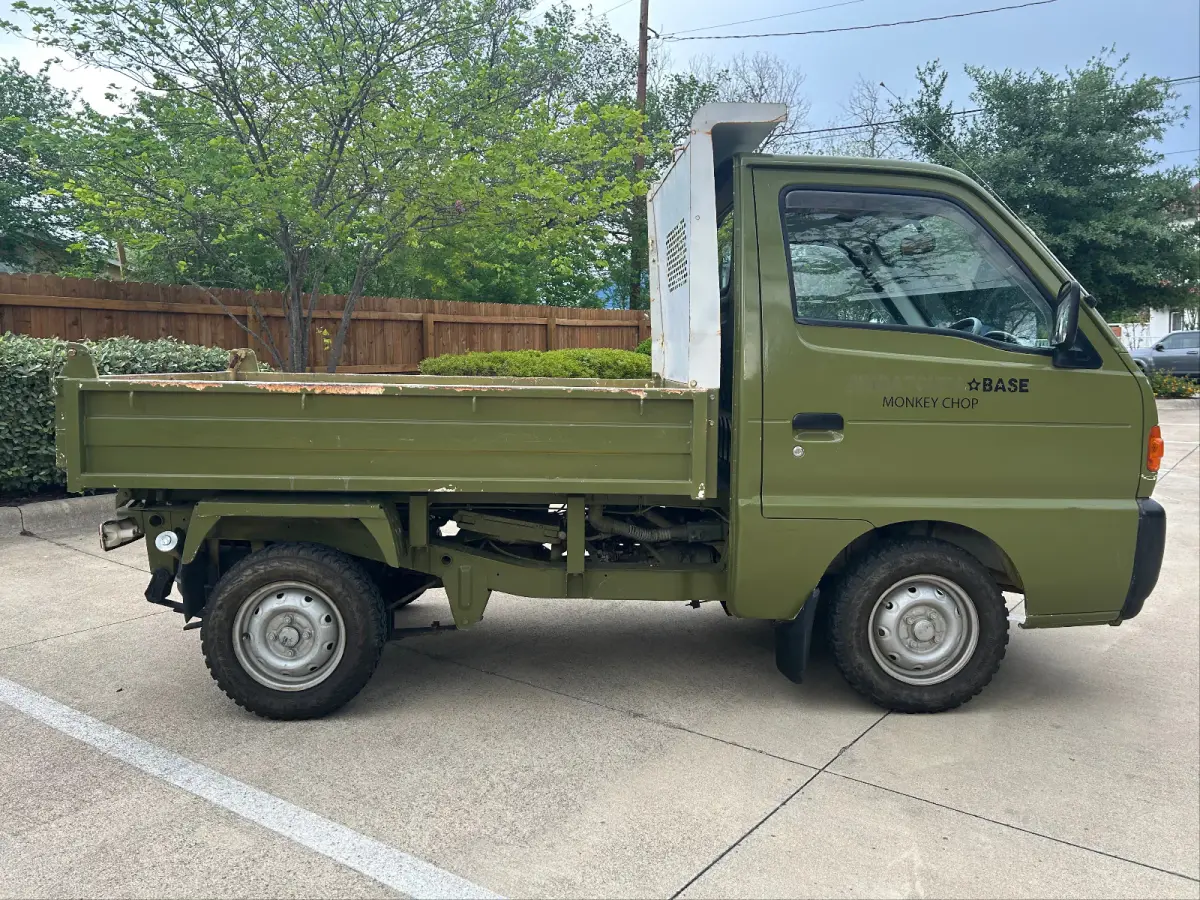 1997 Suzuki Carry Dump, 2WD + AC, a Kei Truck, for sale at Sunshine Imports in Austin, TX (photo 9 of 12)