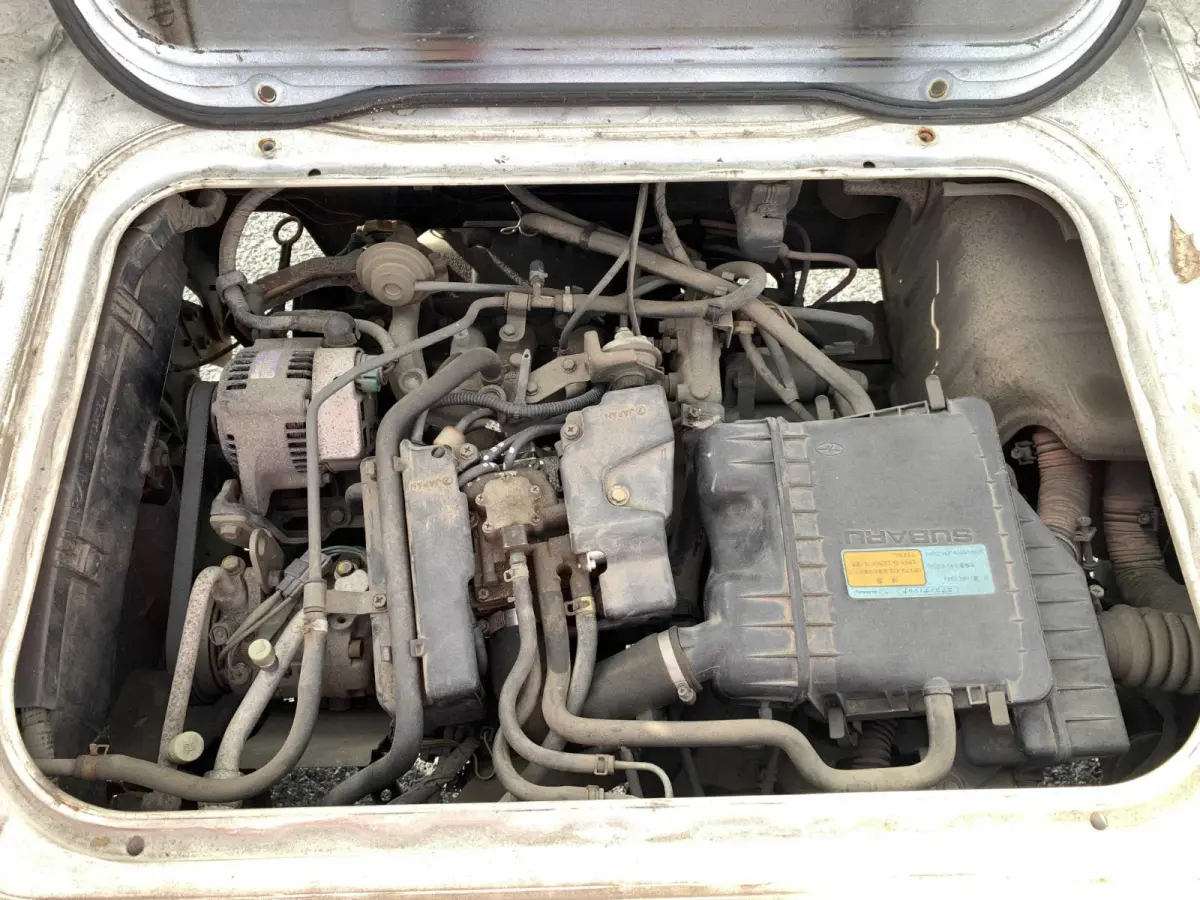 1998 Subaru Sambar 4x4 Kei Truck, engine compartment, sold at Sunshine Imports in Austin, TX