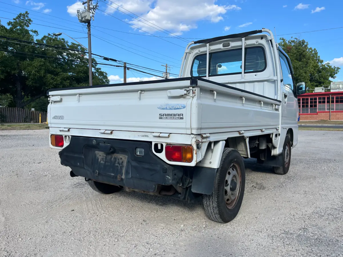 1998 Subaru Sambar 4x4 Kei Truck, rear three-quarter view, sold at Sunshine Imports in Austin, TX