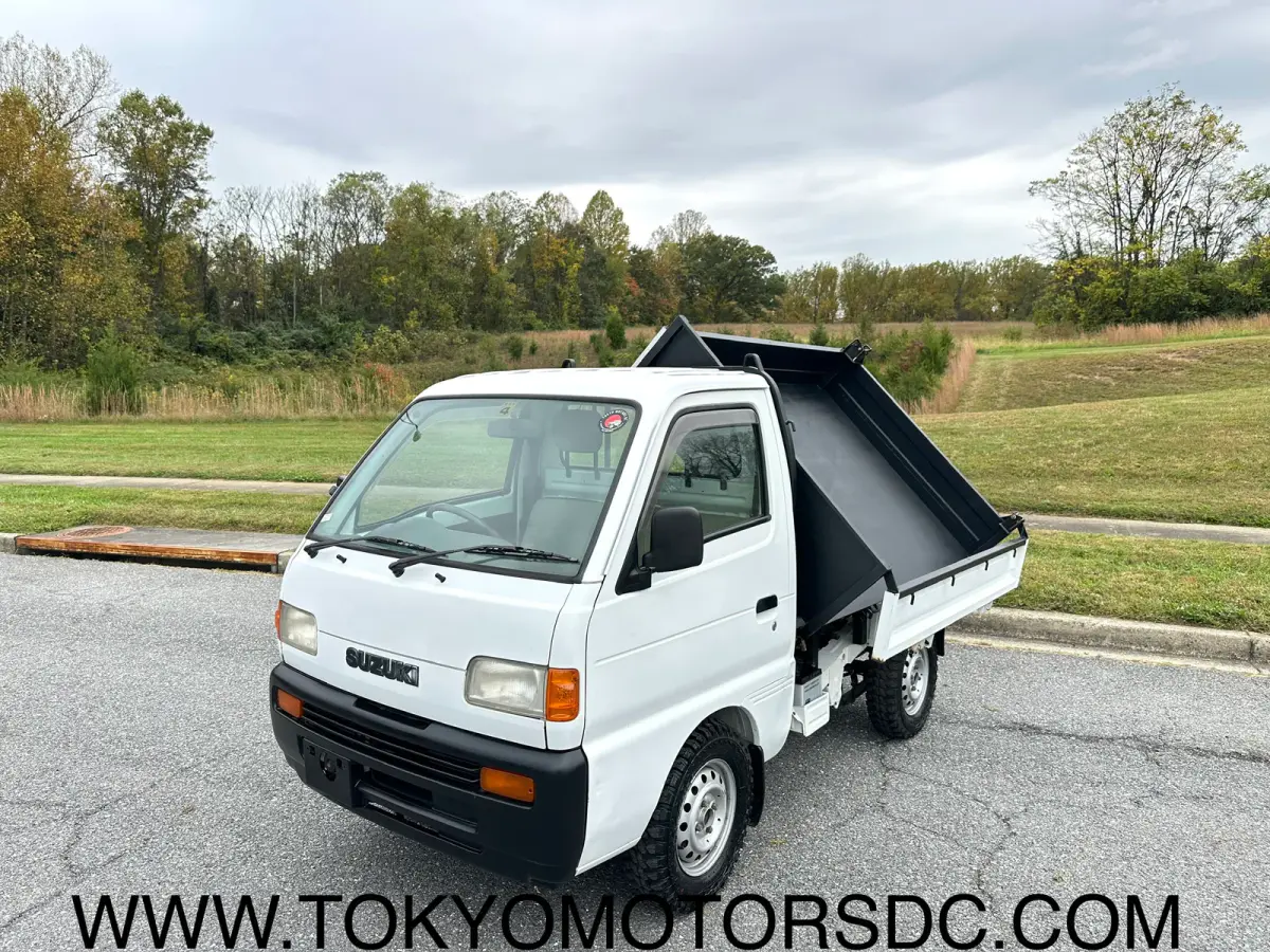 1998 Suzuki Carry 3-way Dump 4WD, a Kei Truck, for sale at Tokyo Motors DC in Boyds, MD (photo 1 of 12)