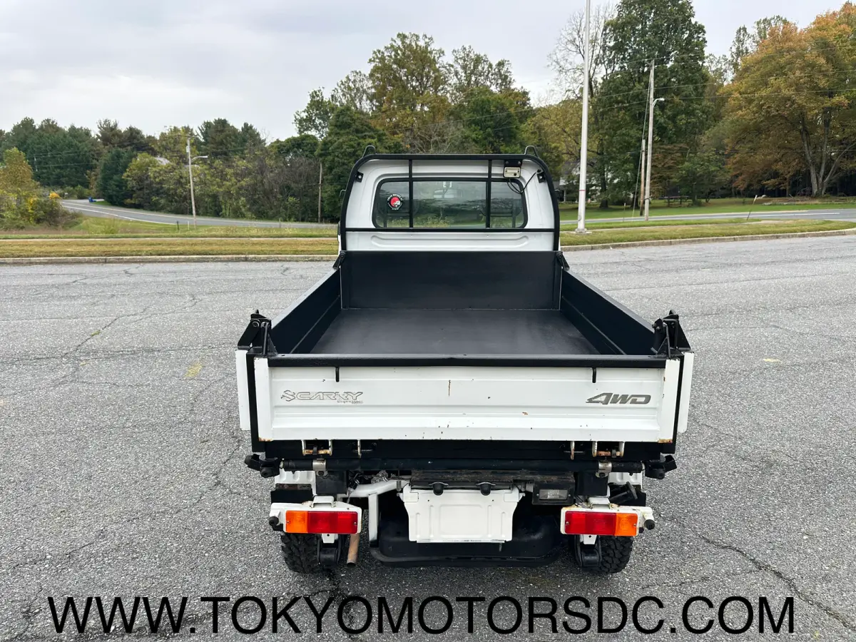 1998 Suzuki Carry 3-way Dump 4WD, a Kei Truck, for sale at Tokyo Motors DC in Boyds, MD (photo 10 of 12)