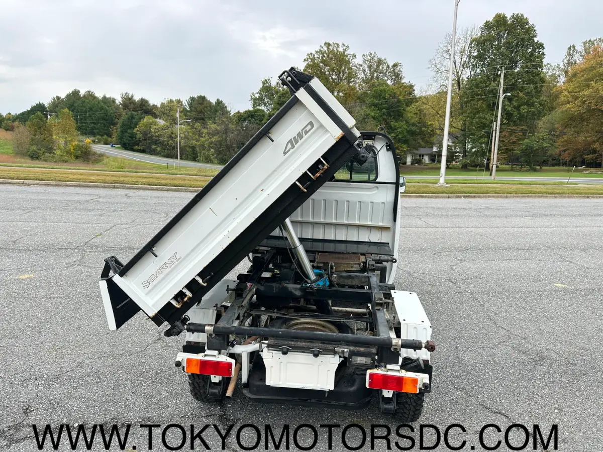 1998 Suzuki Carry 3-way Dump 4WD, a Kei Truck, for sale at Tokyo Motors DC in Boyds, MD (photo 11 of 12)