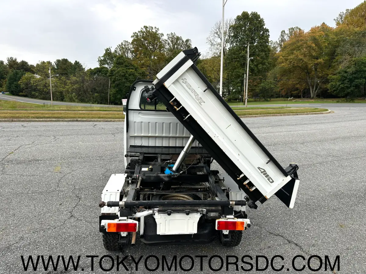 1998 Suzuki Carry 3-way Dump 4WD, a Kei Truck, for sale at Tokyo Motors DC in Boyds, MD (photo 12 of 12)