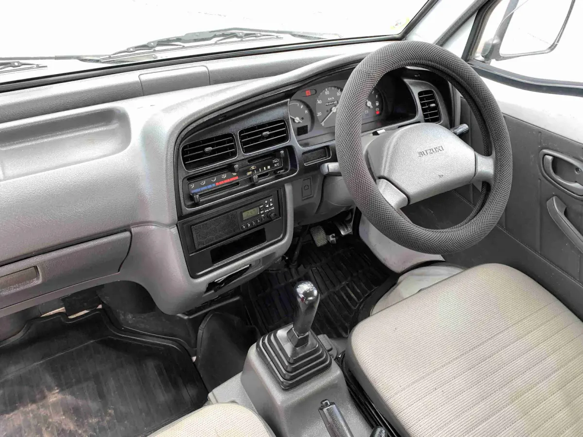 1998 Suzuki Carry, 4WD + AC, a Kei Truck, for sale at Sunshine Imports in Austin, TX (photo 7 of 12)