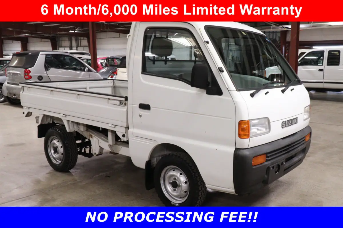 White 1998 Suzuki Carry 4x4 Kei Truck, front three-quarter view, for sale at Duncan Imports in Christiansburg, VA