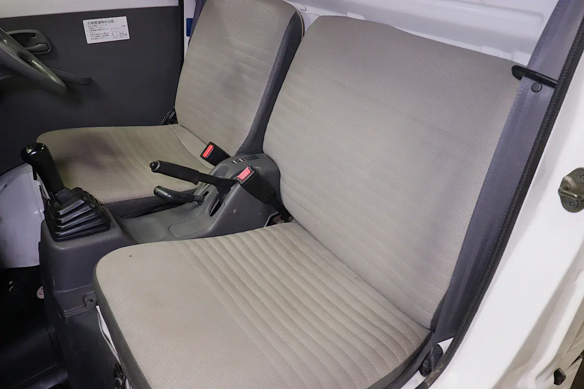 White 1998 Suzuki Carry 4x4 Kei Truck, seats and interior, for sale at Duncan Imports in Christiansburg, VA