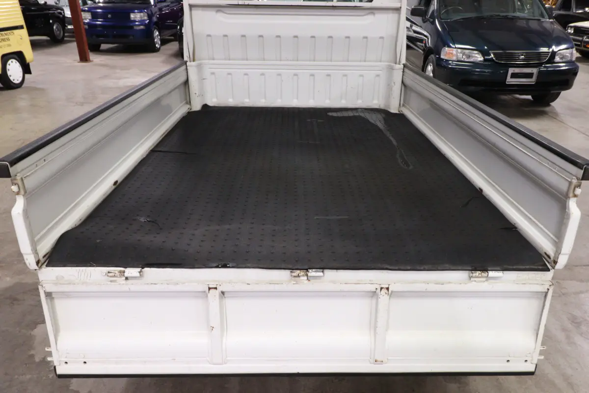White 1998 Suzuki Carry 4x4 Kei Truck, cargo bed, for sale at Duncan Imports in Christiansburg, VA