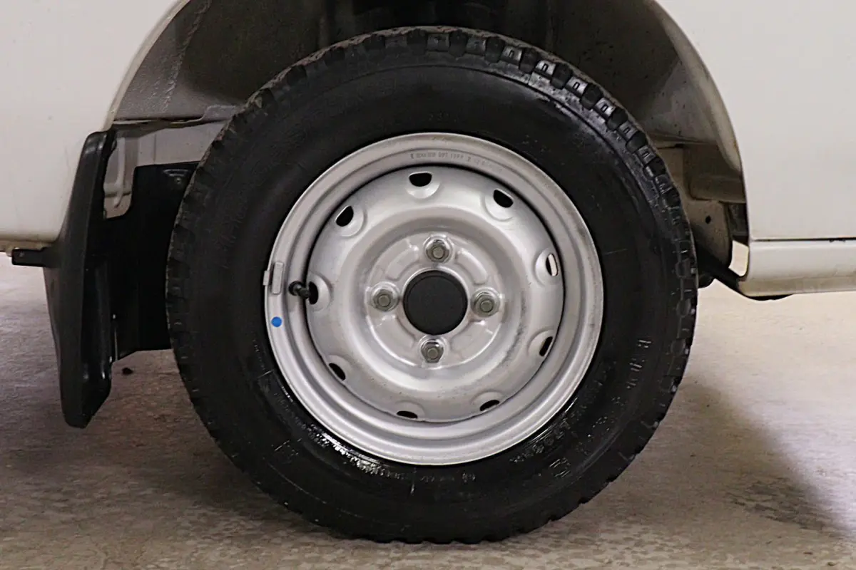 White 1998 Suzuki Carry 4x4 Kei Truck, wheel and tire, for sale at Duncan Imports in Christiansburg, VA