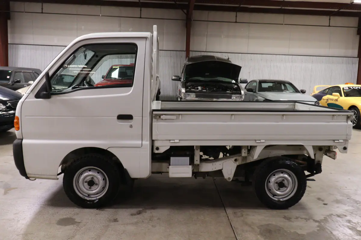 White 1998 Suzuki Carry 4x4 Kei Truck, side view, for sale at Duncan Imports in Christiansburg, VA