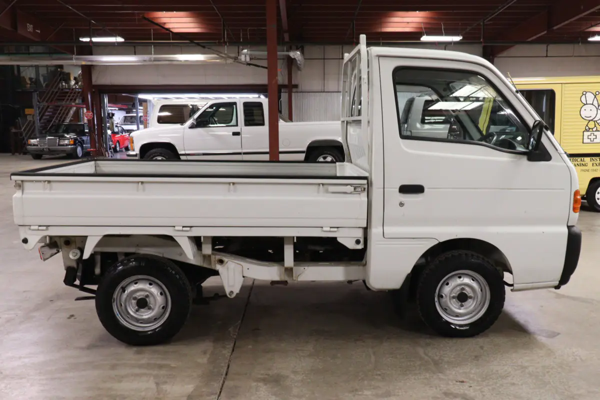 White 1998 Suzuki Carry 4x4 Kei Truck, side view, for sale at Duncan Imports in Christiansburg, VA