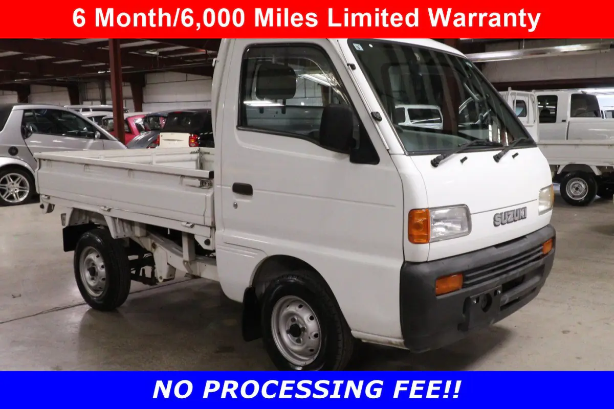 White 1998 Suzuki Carry 4x4 Kei Truck, front three-quarter view, for sale at Duncan Imports in Christiansburg, VA