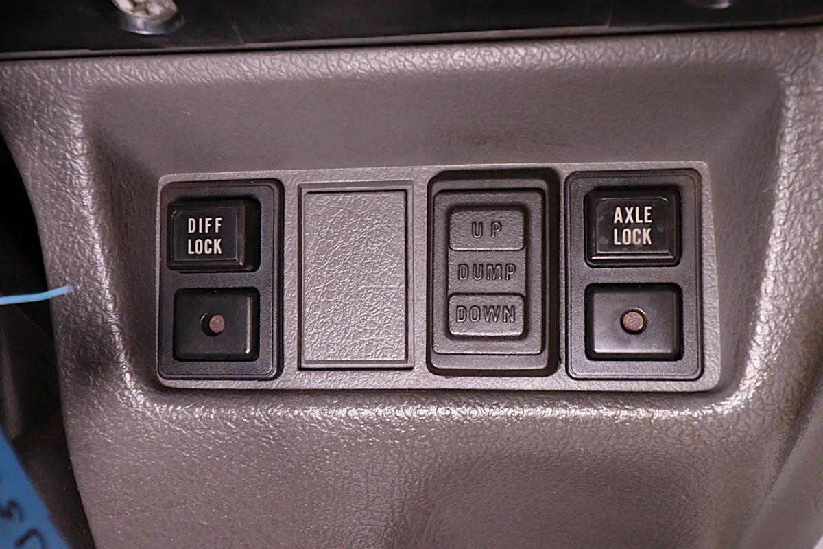 White 1998 Suzuki Carry 4x4 Kei Truck, dump and diff lock switches, for sale at Duncan Imports in Christiansburg, VA