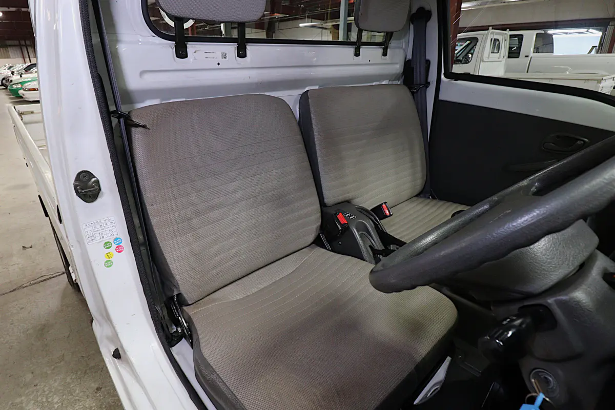 White 1998 Suzuki Carry 4x4 Kei Truck, seats and cab interior, for sale at Duncan Imports in Christiansburg, VA