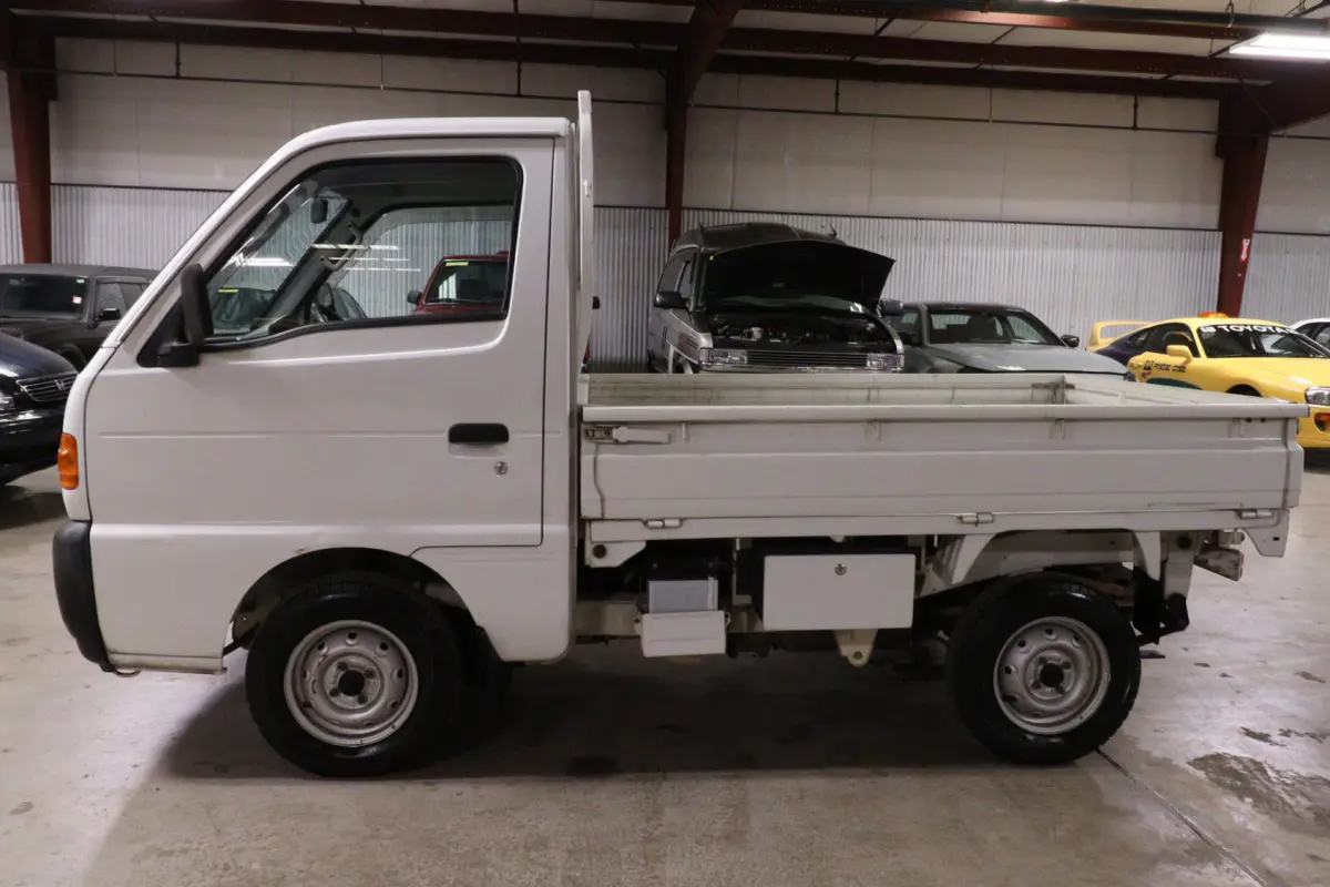White 1998 Suzuki Carry 4x4 Kei Truck, side view, for sale at Duncan Imports in Christiansburg, VA