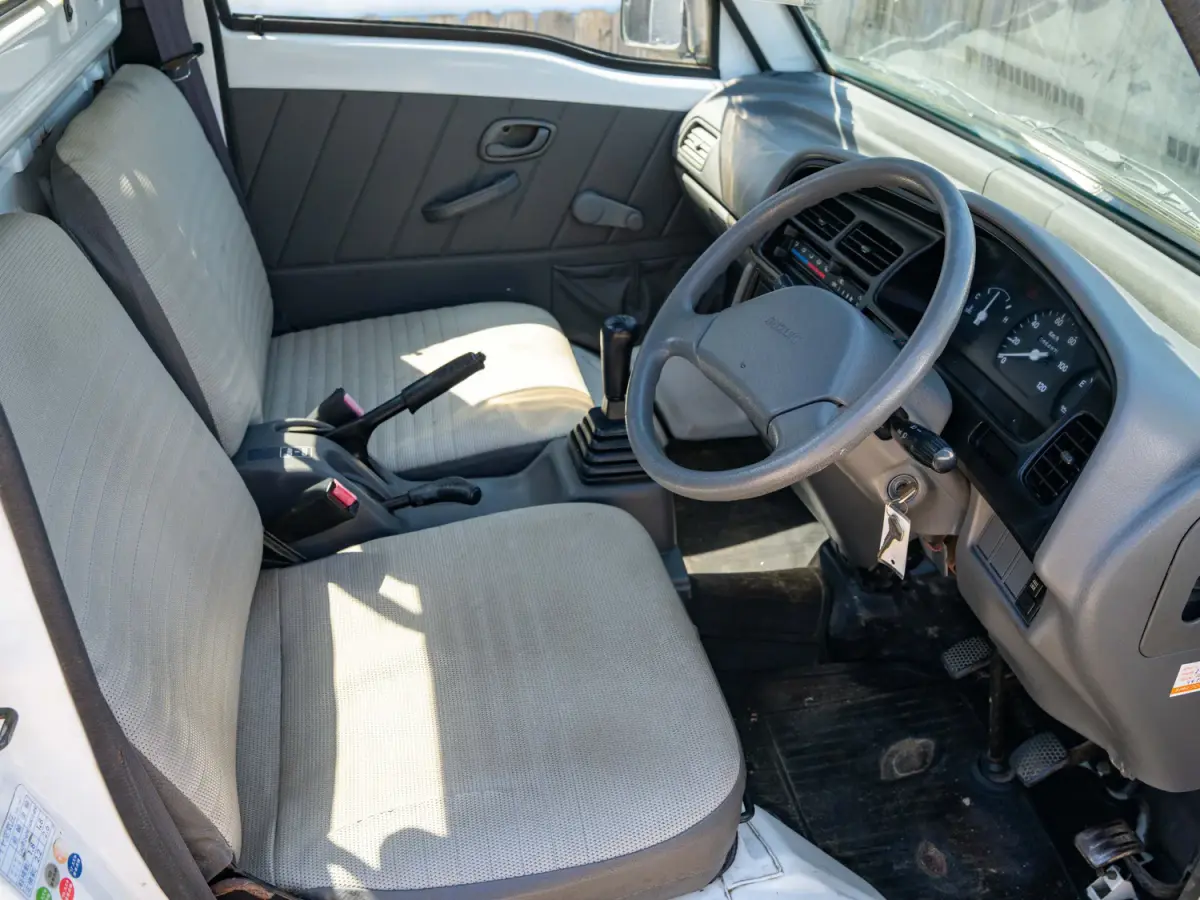1998 Suzuki Carry, a white Kei Truck, for sale at Japan Direct Motors in Irmo, SC (photo 11 of 12)