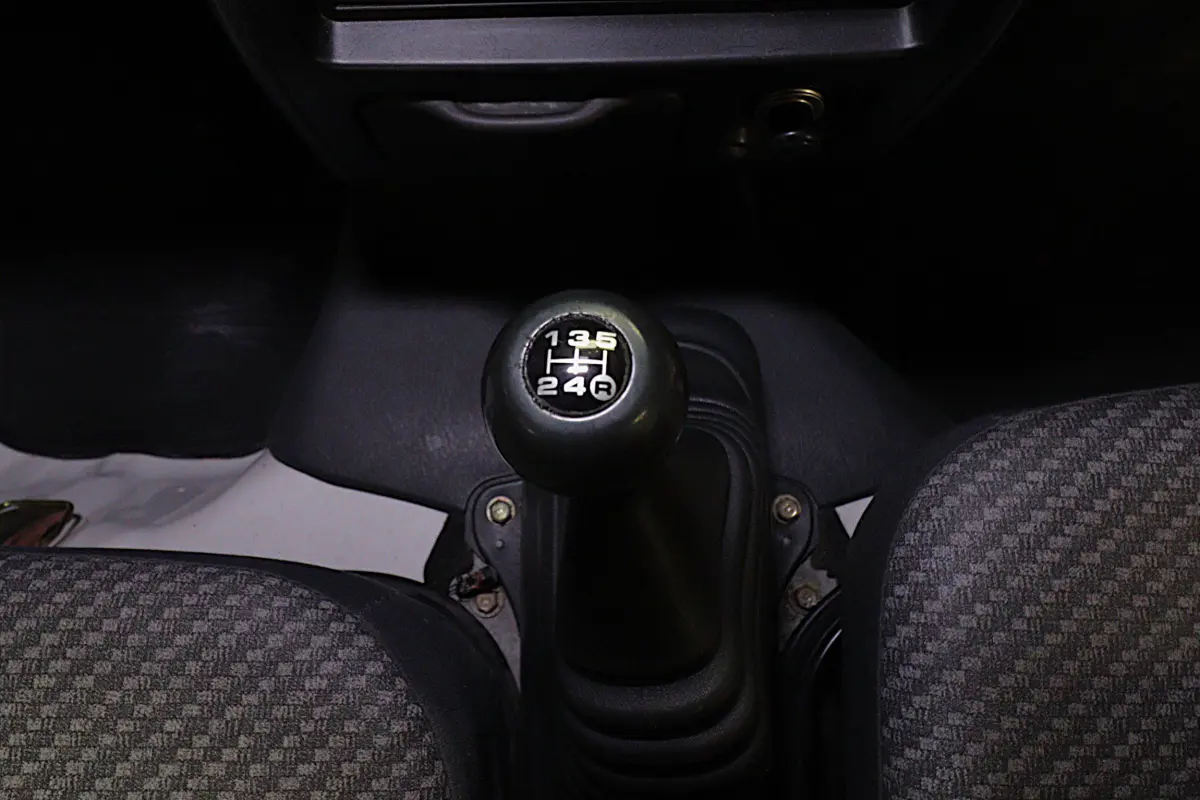 White 1999 Daihatsu Hijet 4x4 Kei Truck, gear shifter, for sale at Duncan Imports in Christiansburg, VA