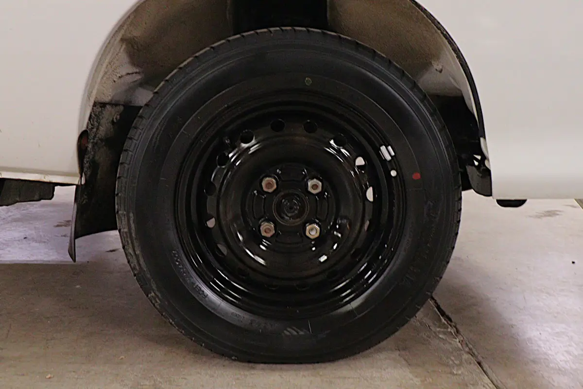 White 1999 Daihatsu Hijet 4x4 Kei Truck, wheel and tire, for sale at Duncan Imports in Christiansburg, VA