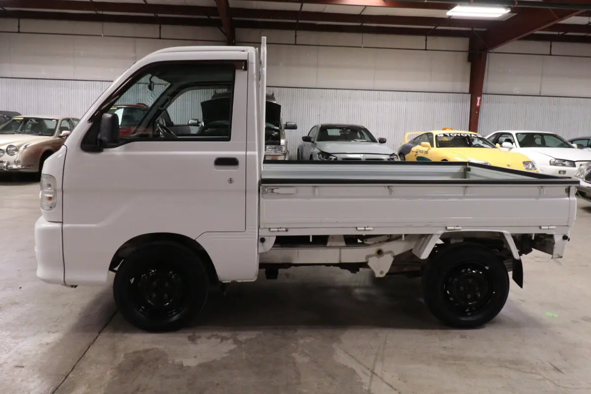 White 1999 Daihatsu Hijet 4x4 Kei Truck, side view, for sale at Duncan Imports in Christiansburg, VA