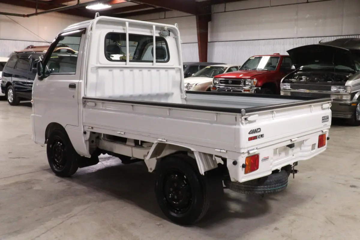 White 1999 Daihatsu Hijet 4x4 Kei Truck, rear three-quarter view, for sale at Duncan Imports in Christiansburg, VA