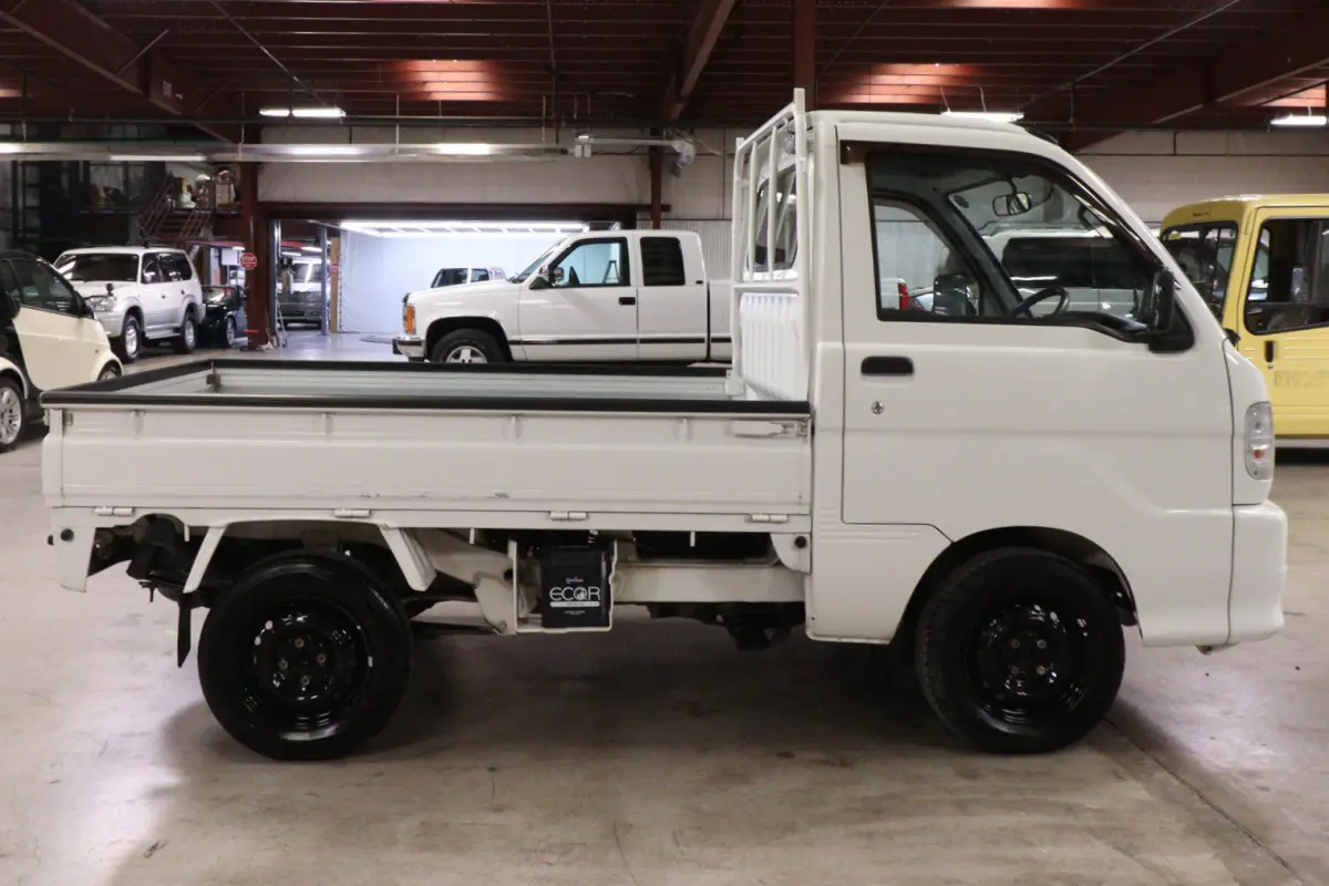 White 1999 Daihatsu Hijet 4x4 Kei Truck, side view, for sale at Duncan Imports in Christiansburg, VA