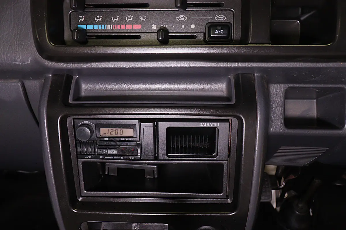 White 1999 Daihatsu Hijet 4x4 Kei Truck, radio and climate controls, for sale at Duncan Imports in Christiansburg, VA