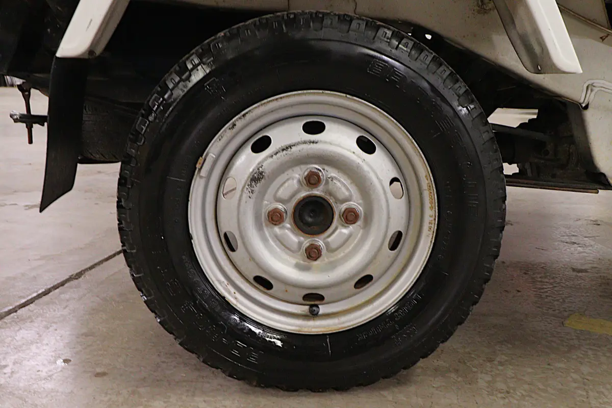 White 1999 Daihatsu Hijet 4x4 Kei Truck, wheel and tire, for sale at Duncan Imports in Christiansburg, VA