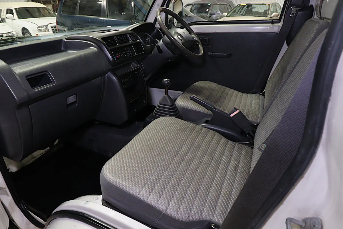 White 1999 Daihatsu Hijet 4x4 Kei Truck, cab interior, for sale at Duncan Imports in Christiansburg, VA