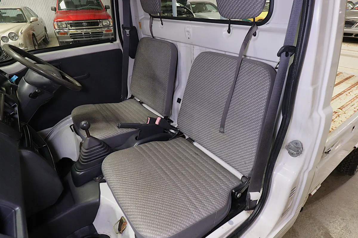 White 1999 Daihatsu Hijet 4x4 Kei Truck, seats and interior, for sale at Duncan Imports in Christiansburg, VA