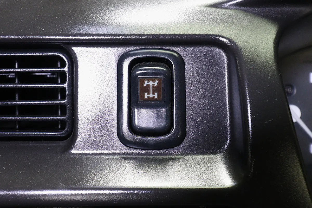 White 1999 Daihatsu Hijet 4x4 Kei Truck, 4WD button, for sale at Duncan Imports in Christiansburg, VA