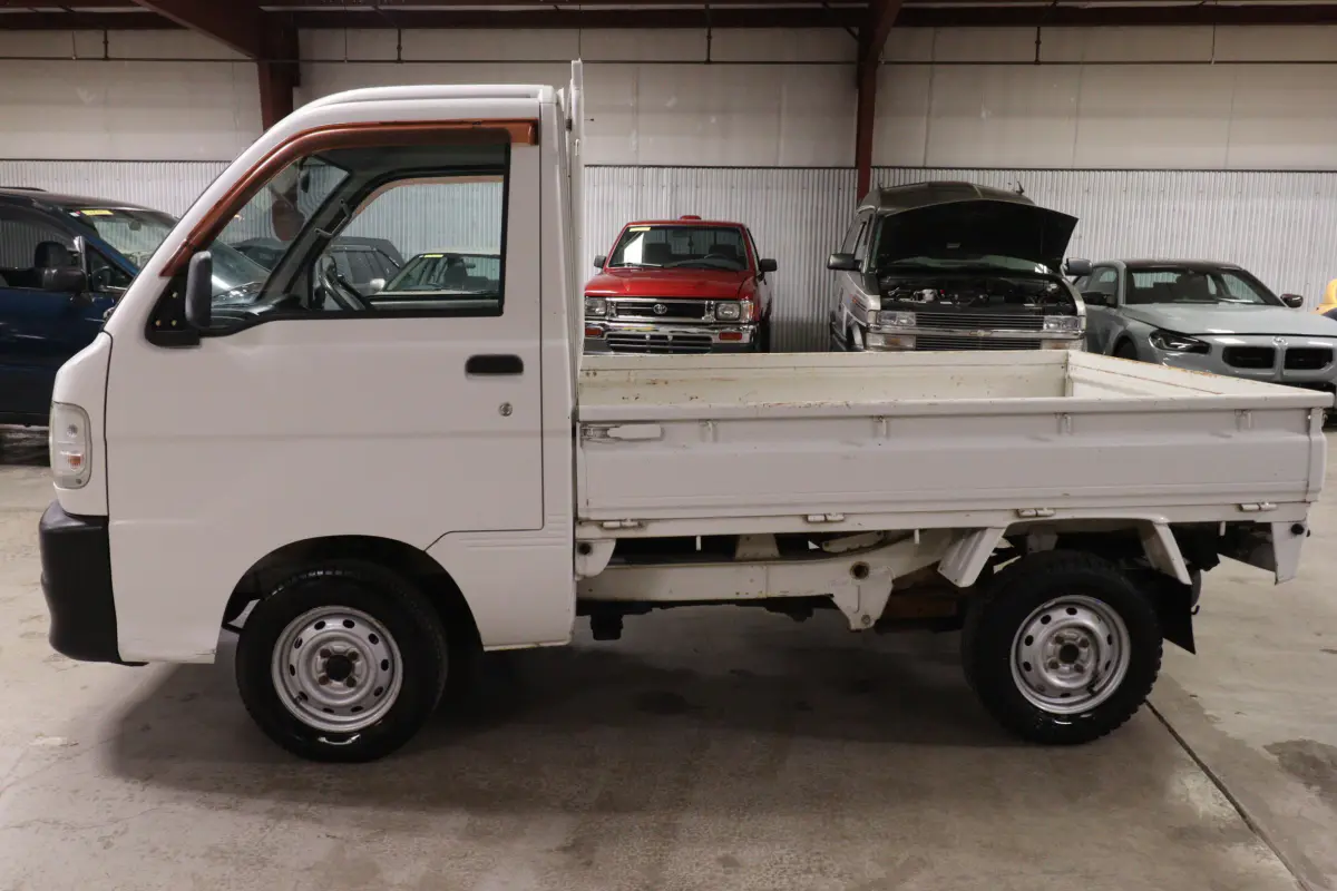 White 1999 Daihatsu Hijet 4x4 Kei Truck, side view, for sale at Duncan Imports in Christiansburg, VA