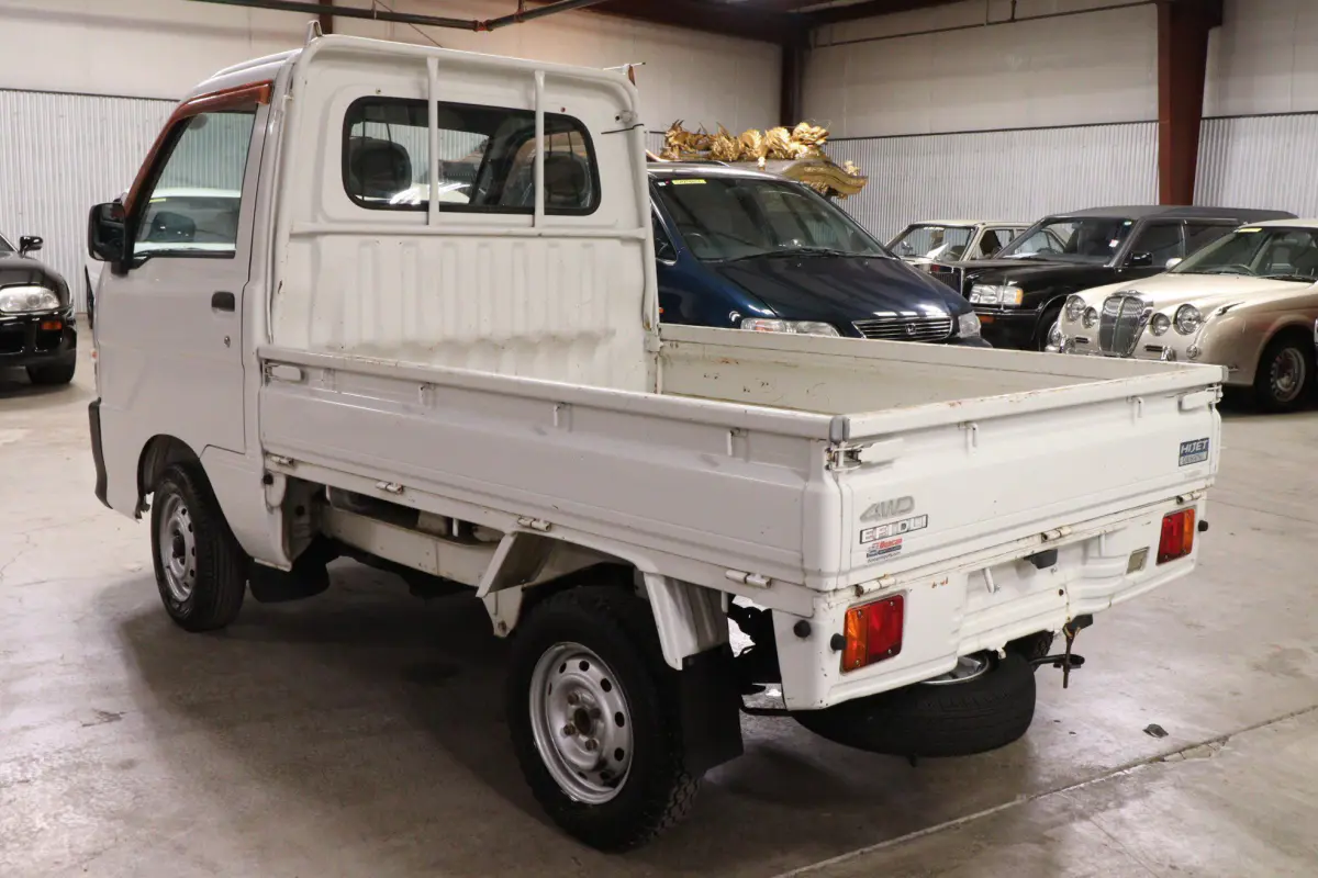 White 1999 Daihatsu Hijet 4x4 Kei Truck, rear three-quarter view, for sale at Duncan Imports in Christiansburg, VA