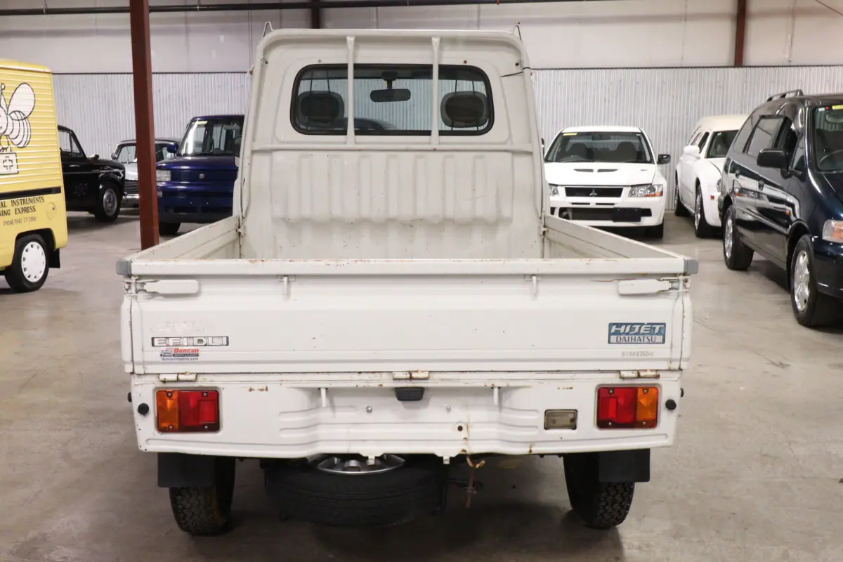 White 1999 Daihatsu Hijet 4x4 Kei Truck, rear view, for sale at Duncan Imports in Christiansburg, VA