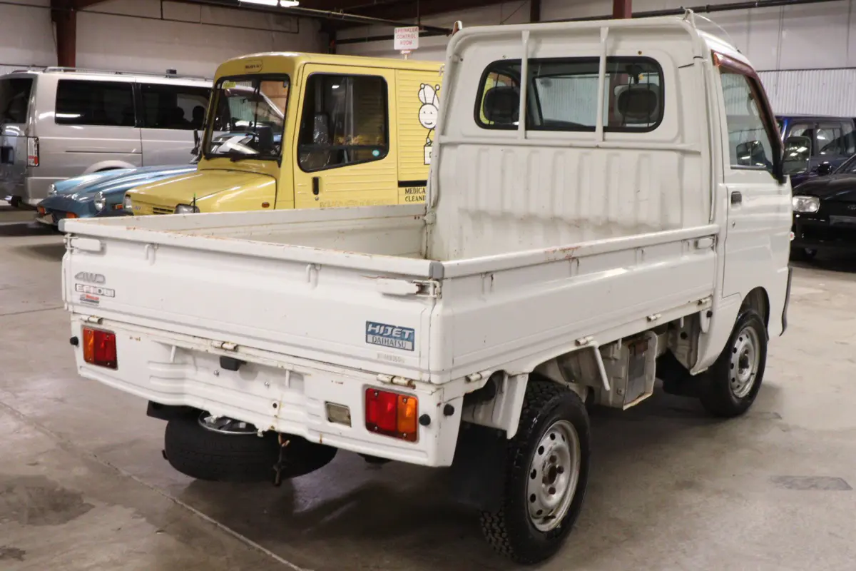 White 1999 Daihatsu Hijet 4x4 Kei Truck, rear three-quarter view, for sale at Duncan Imports in Christiansburg, VA