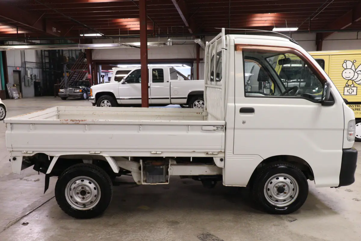 White 1999 Daihatsu Hijet 4x4 Kei Truck, side view, for sale at Duncan Imports in Christiansburg, VA
