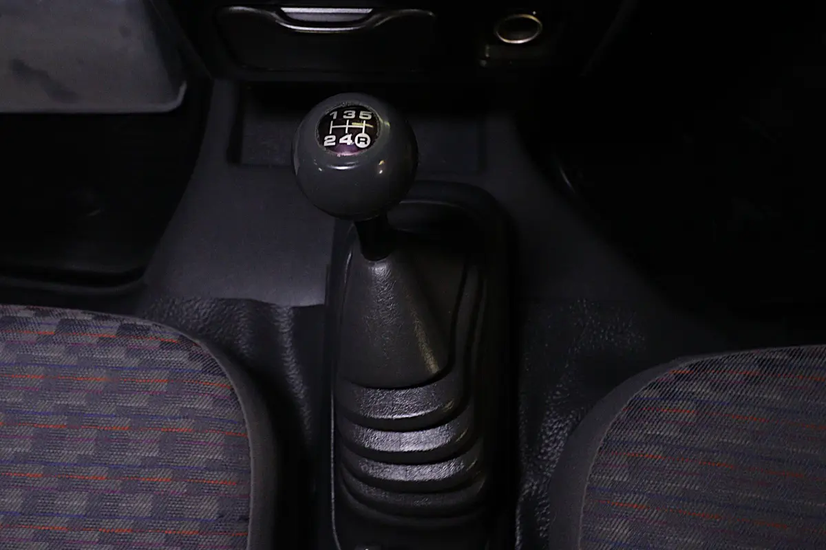 White 1999 Daihatsu Hijet 4x4 Kei Truck, gear shifter, for sale at Duncan Imports in Christiansburg, VA