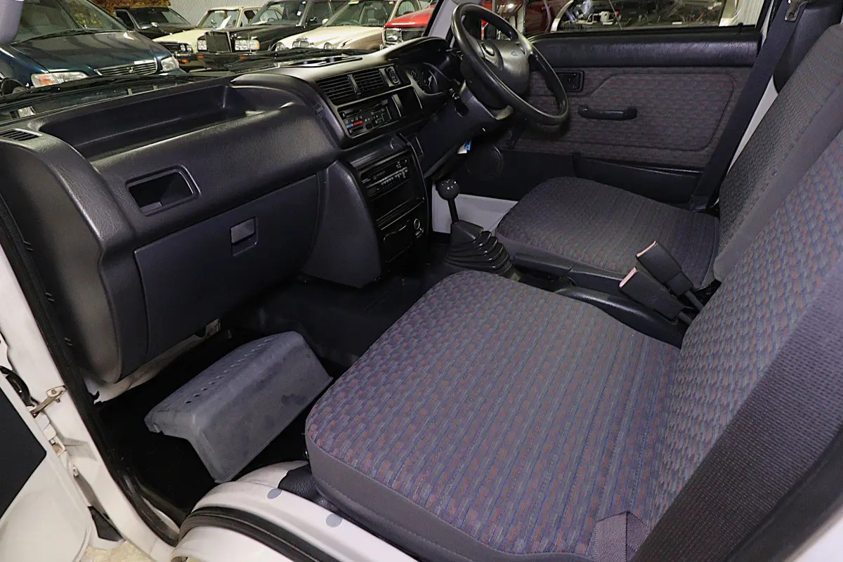 White 1999 Daihatsu Hijet 4x4 Kei Truck, cab interior and seats, for sale at Duncan Imports in Christiansburg, VA