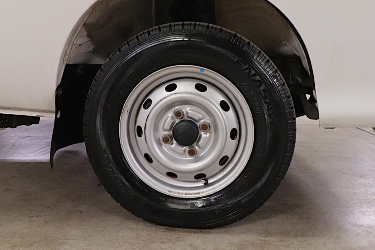 White 1999 Daihatsu Hijet 4x4 Kei Truck, wheel and tire, for sale at Duncan Imports in Christiansburg, VA