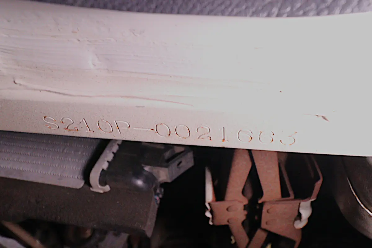 White 1999 Daihatsu Hijet 4x4 Kei Truck, chassis number stamp, for sale at Duncan Imports in Christiansburg, VA