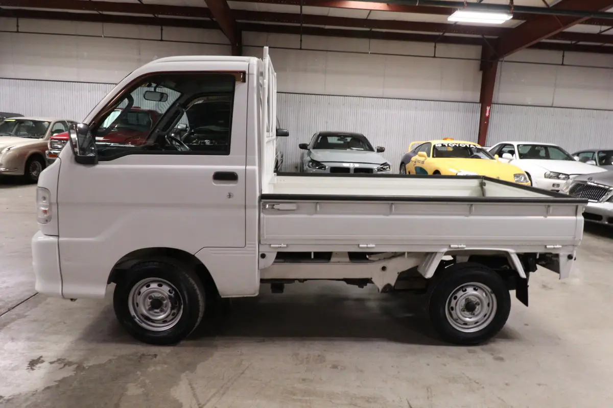 White 1999 Daihatsu Hijet 4x4 Kei Truck, side view, for sale at Duncan Imports in Christiansburg, VA