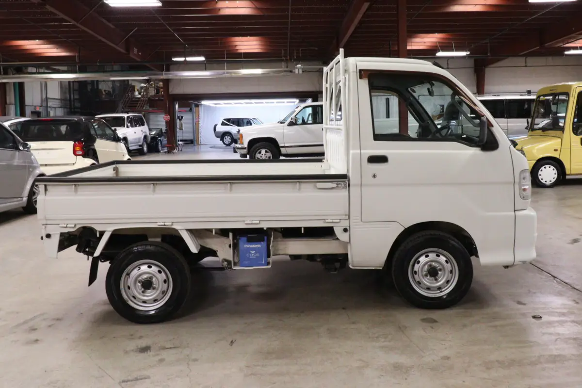 White 1999 Daihatsu Hijet 4x4 Kei Truck, side view, for sale at Duncan Imports in Christiansburg, VA