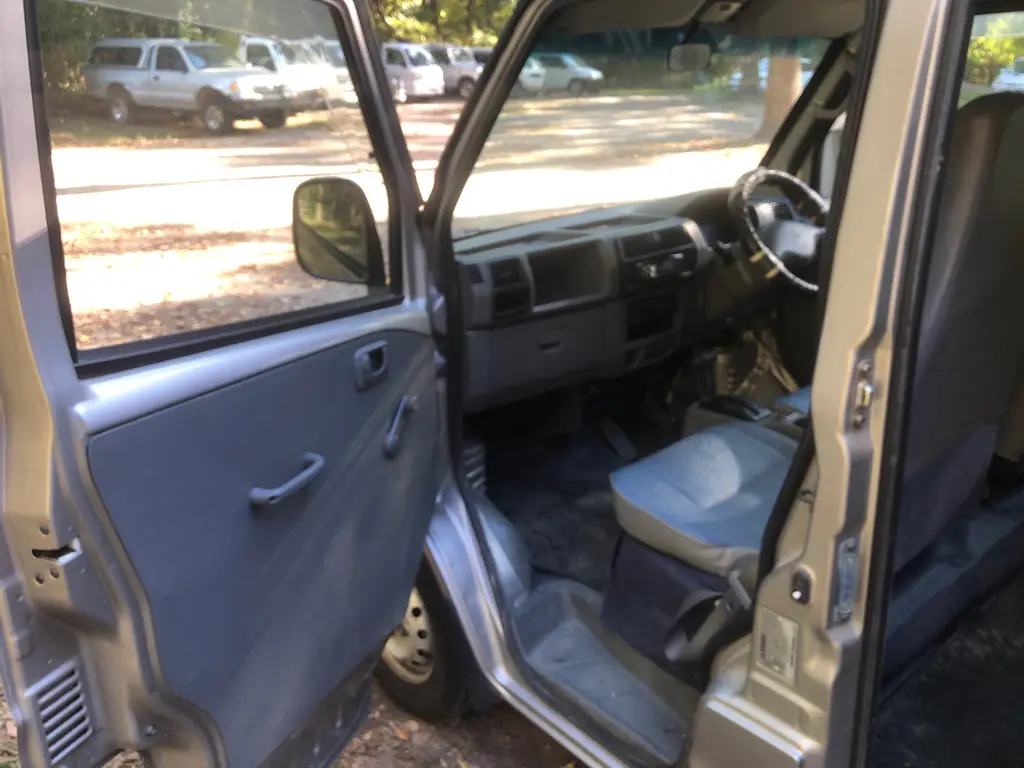 1999 Mitsubishi Minicab 4x4 Kei Van, front interior with door open, for sale at Fun Karz in North Little Rock, AR
