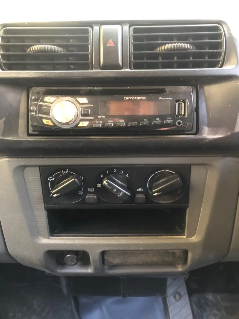 1999 Mitsubishi Minicab 4x4 Kei Van, stereo and climate controls, for sale at Fun Karz in North Little Rock, AR