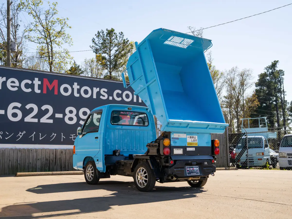 1999 Subaru Sambar Dump Bed, a blue Kei Truck, for sale at Japan Direct Motors in Irmo, SC (photo 10 of 12)