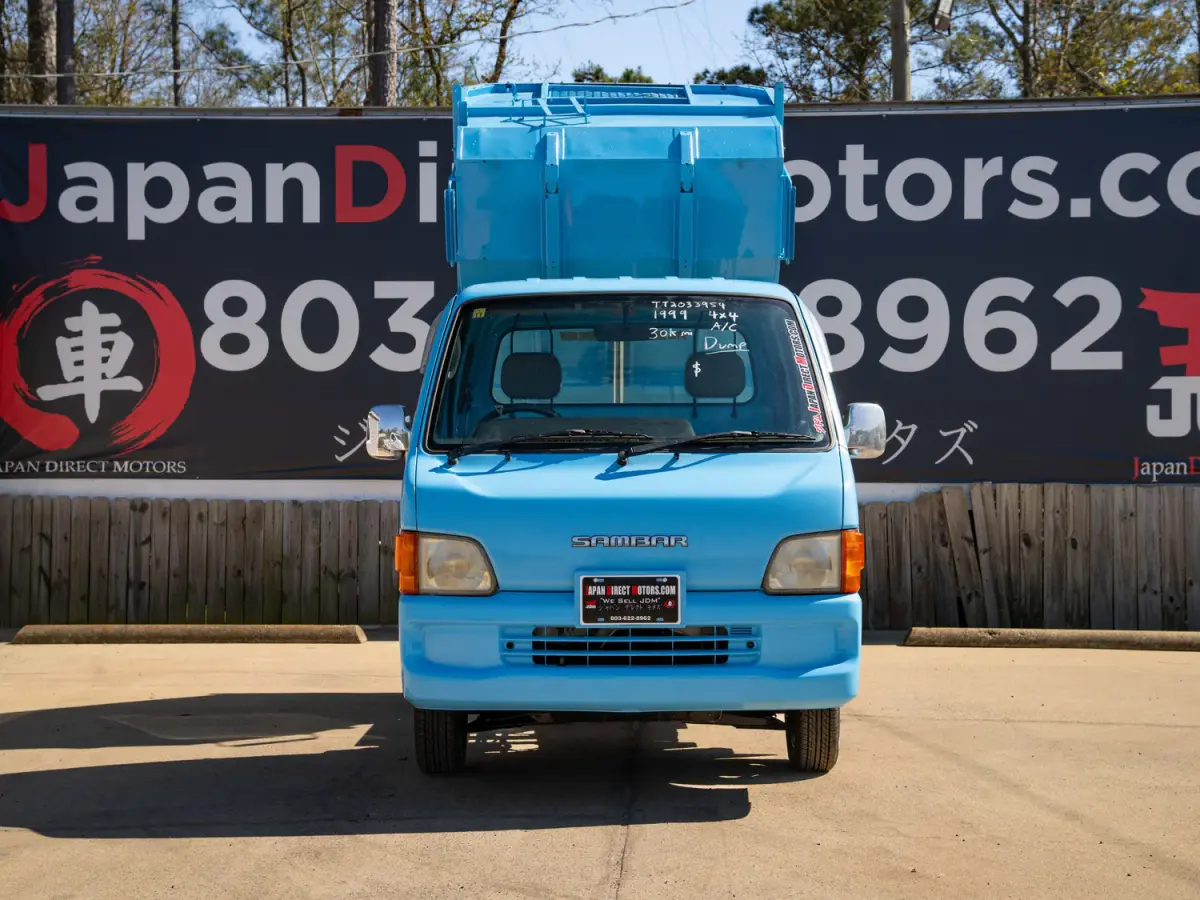 1999 Subaru Sambar Dump Bed, a blue Kei Truck, for sale at Japan Direct Motors in Irmo, SC (photo 4 of 12)