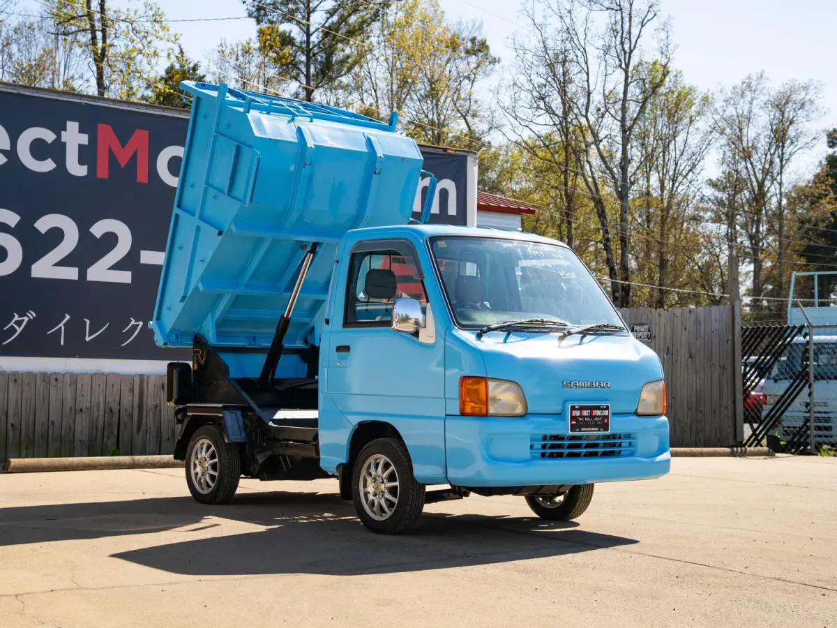 1999 Subaru Sambar Dump Bed, a blue Kei Truck, for sale at Japan Direct Motors in Irmo, SC (photo 5 of 12)