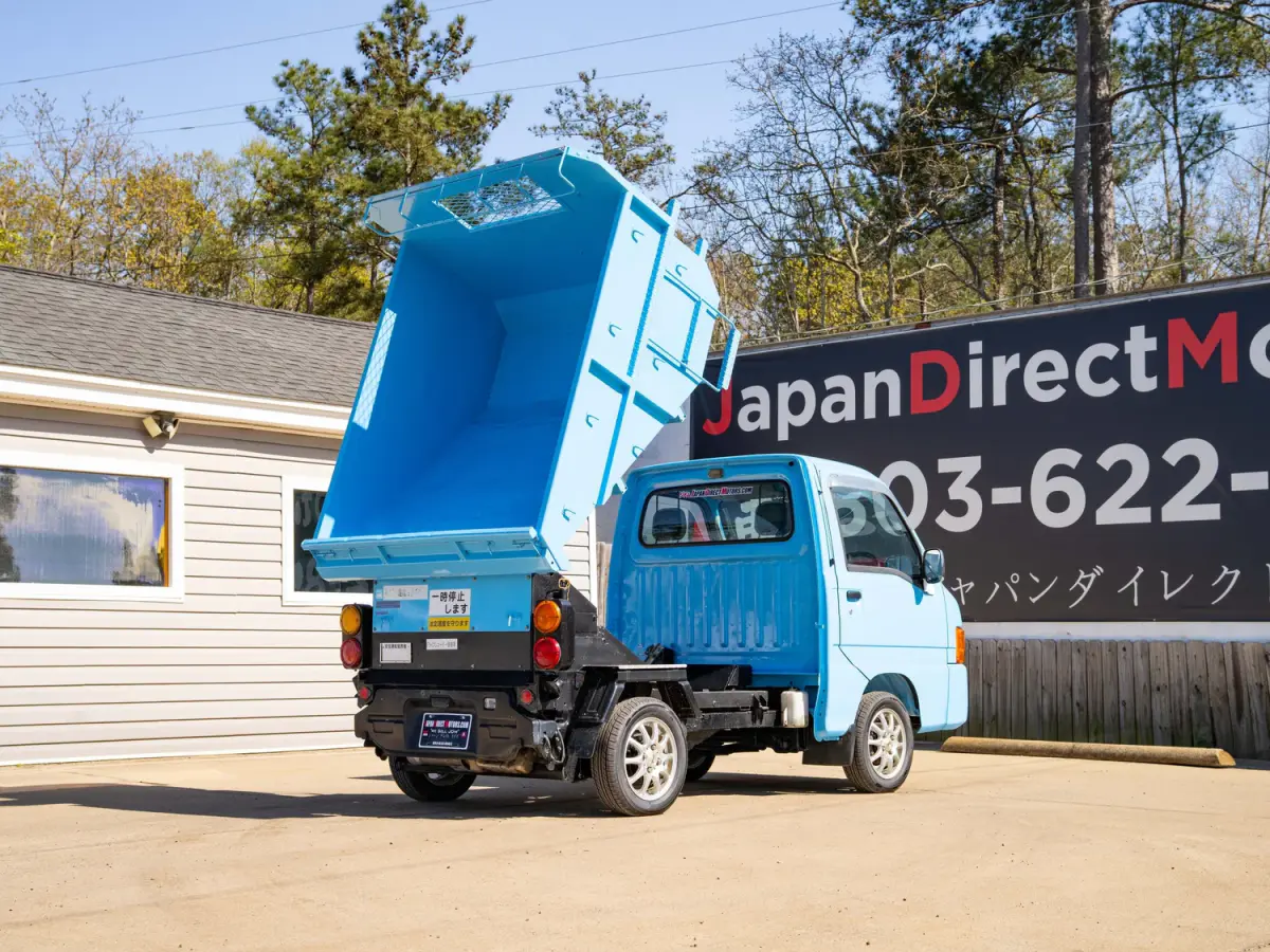 1999 Subaru Sambar Dump Bed, a blue Kei Truck, for sale at Japan Direct Motors in Irmo, SC (photo 8 of 12)