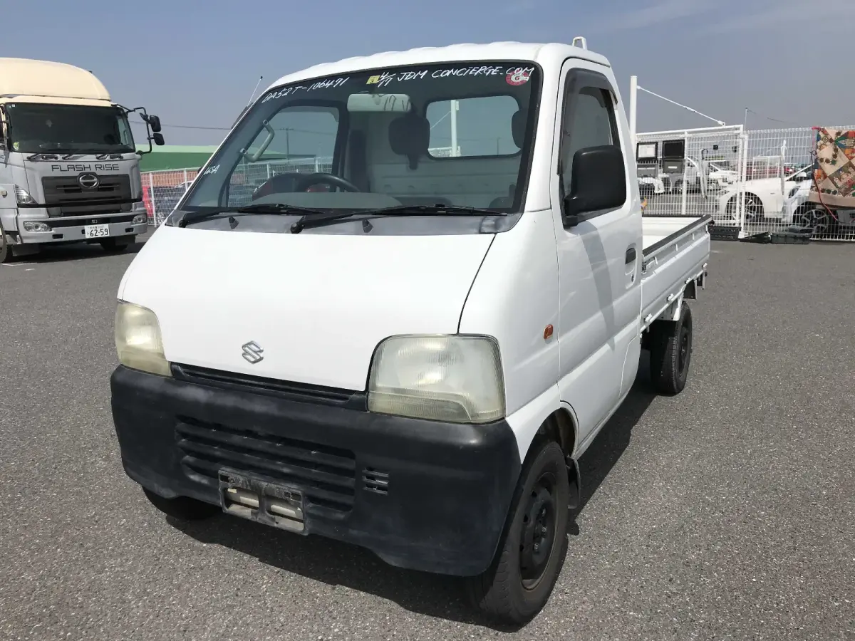 1999 Suzuki Carry, 2WD and AC, a Kei Truck, for sale at Sunshine Imports in Austin, TX (photo 2 of 9)