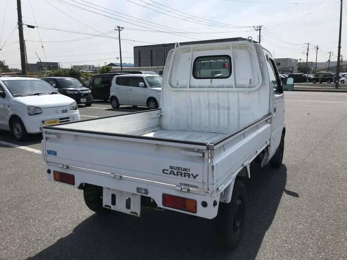 1999 Suzuki Carry, 2WD and AC, a Kei Truck, for sale at Sunshine Imports in Austin, TX (photo 4 of 9)