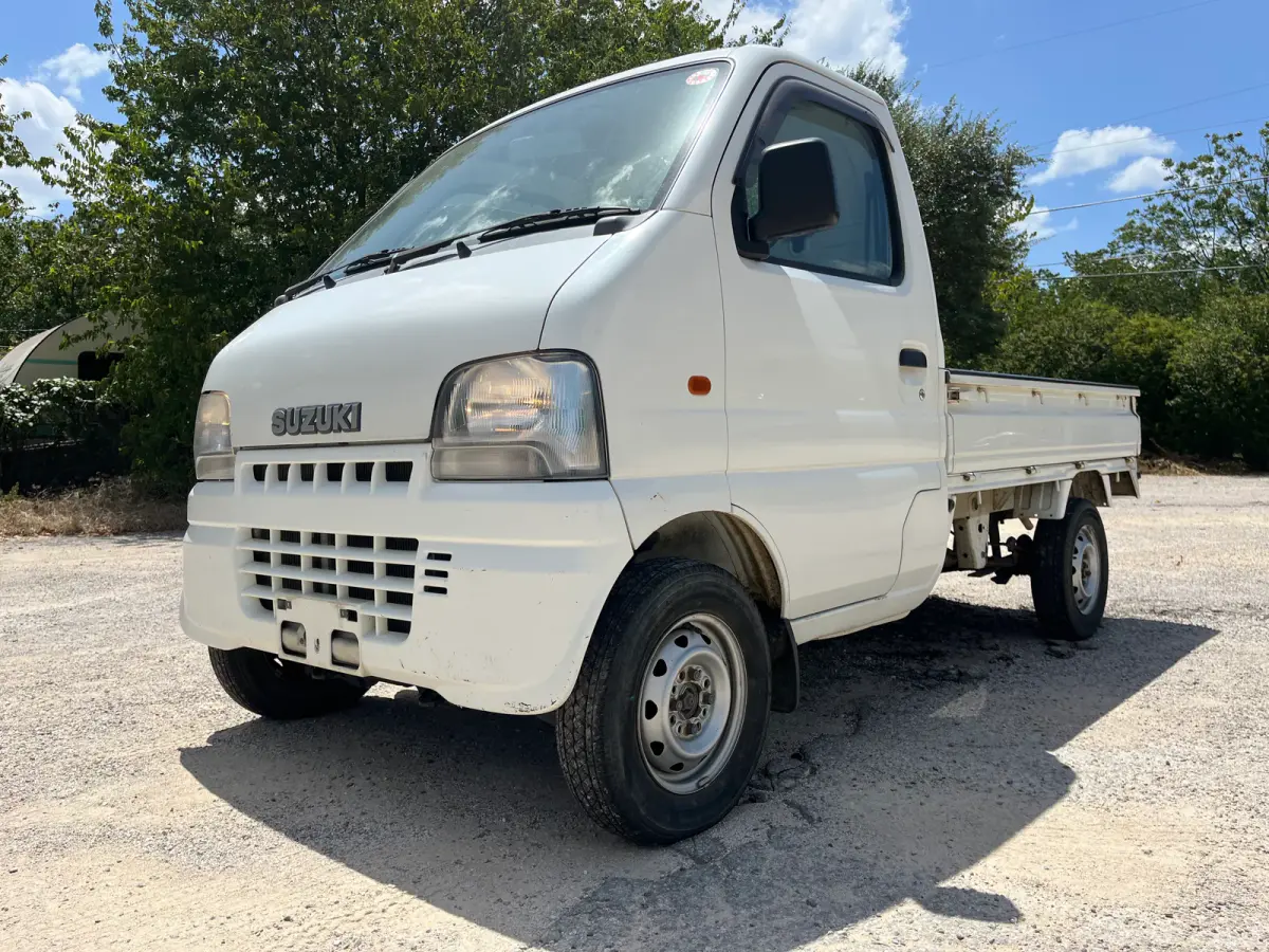 1999 Suzuki Carry, 4WD + AC, a Kei Truck, for sale at Sunshine Imports in Austin, TX (photo 2 of 9)